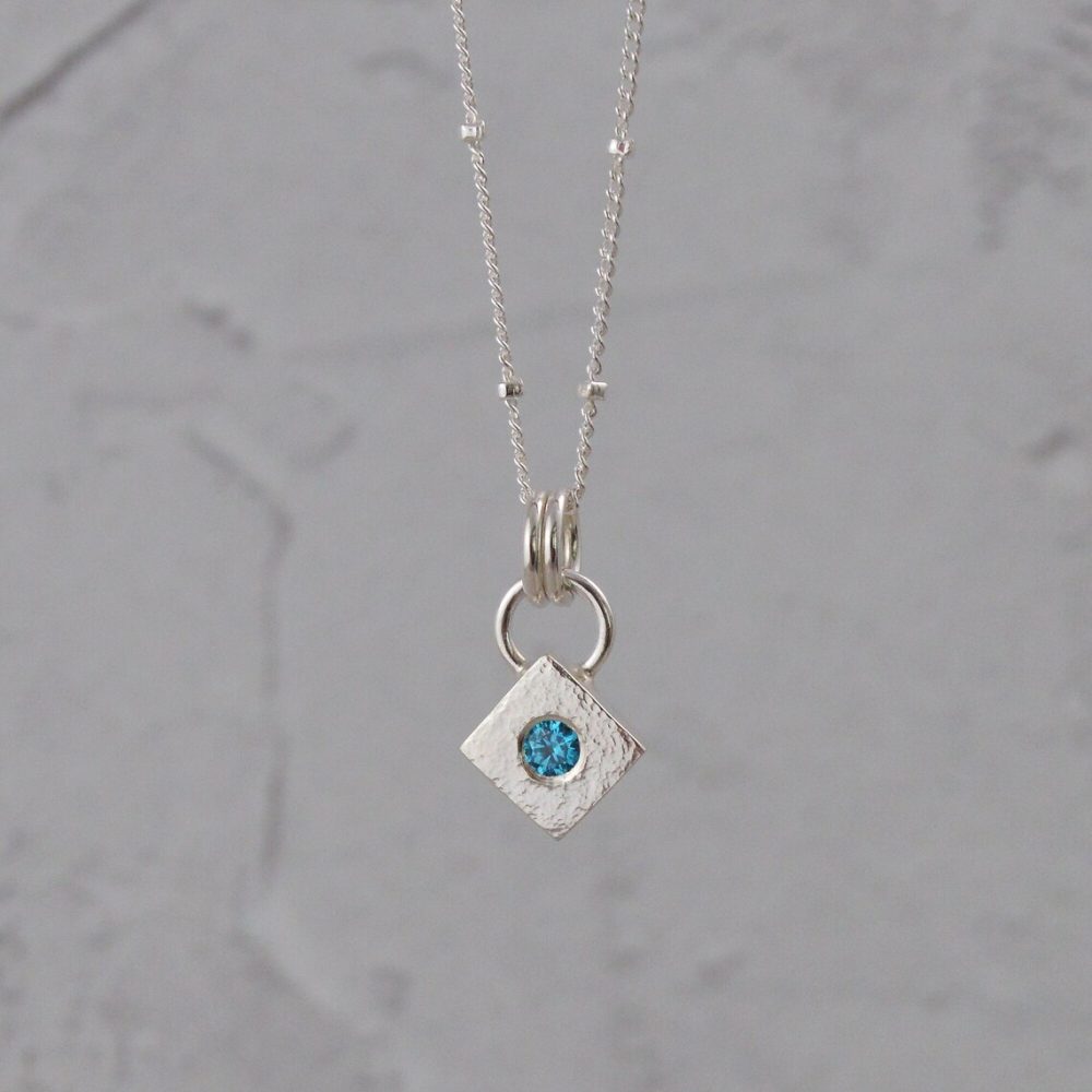 Silver Hammered Aquamarine CZ Pendant - Image 2